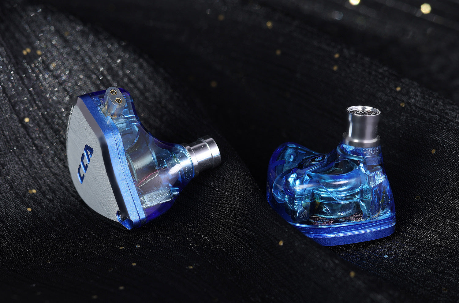 CCA C12 IEM with durable metal faceplate and transparent resin body.