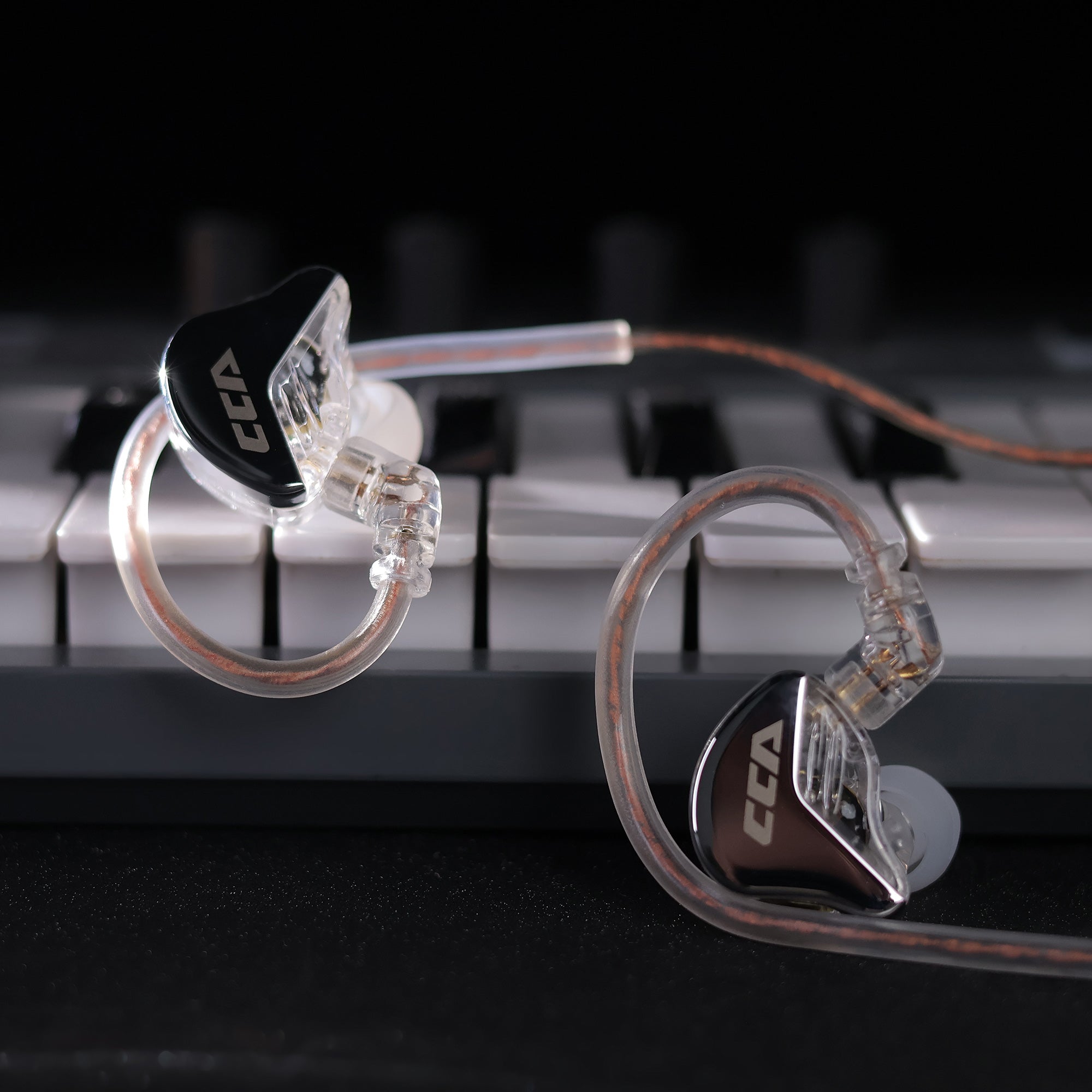 CCA CRA IEM earphones featuring sleek metal housing and clear resin 
