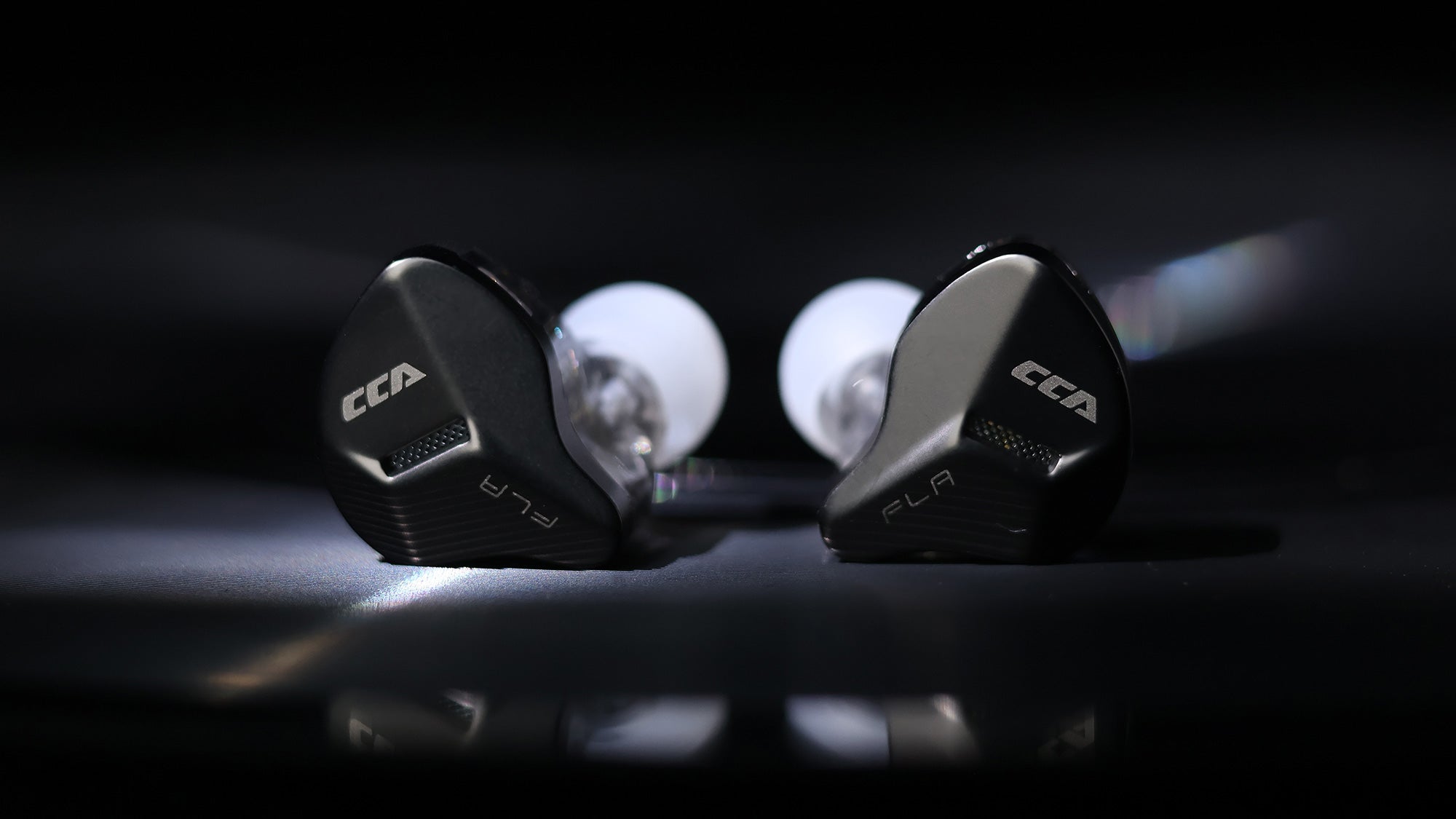 CCA FLA in-ear earphones sleek metal faceplate