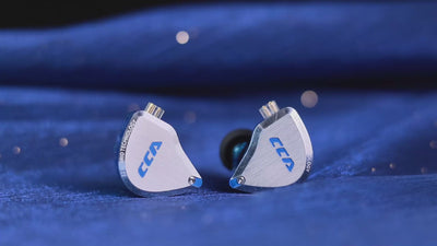 CCA C12 earphones showing zinc alloy faceplate and resin housing.